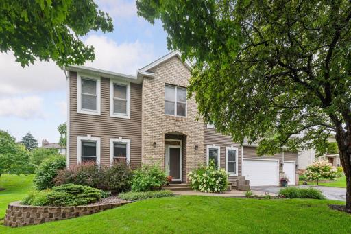 Welcome to 1183 Tristan Trail in the sought after neighborhood of South Ridge Falls in Chaska.