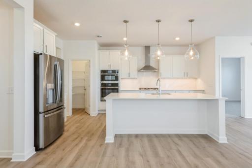 (Photo of a similar home, actual finishes may vary)