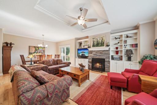Upon entering: crown molding, tray ceiling, and hardwood floors!
