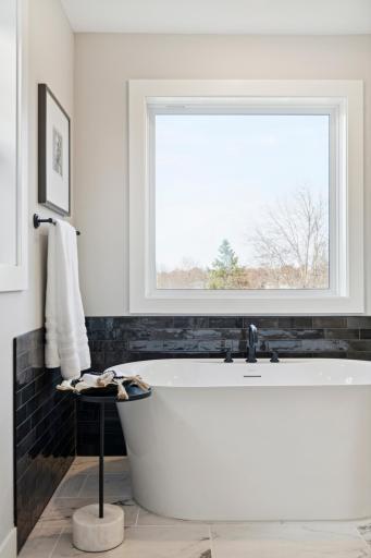 Beautifully paired ceramic tile creating a statement of luxury and relaxation