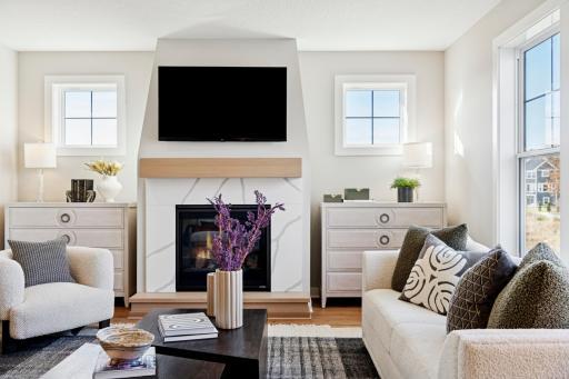 Inviting fireplace adds warmth and character to the main living area