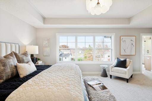 Primary bedroom with room to relax and unwind