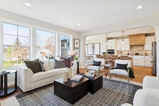 Bright, spacious main level with easy flow between living, cooking, and dining areas