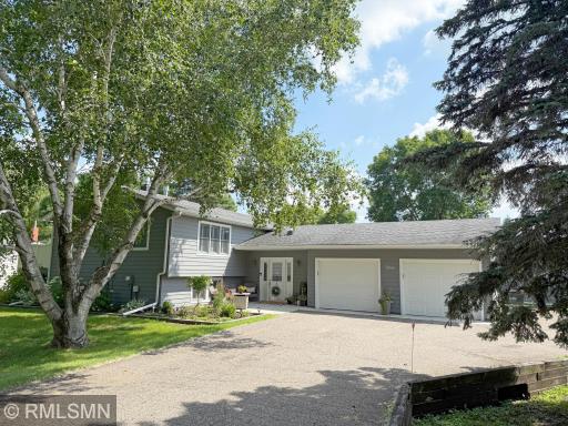 Nestled on the edge of town, this meticulously cared-for tri-level home sits on just over an acre of lush, usable land offering the perfect blend of privacy, space, and convenience.
