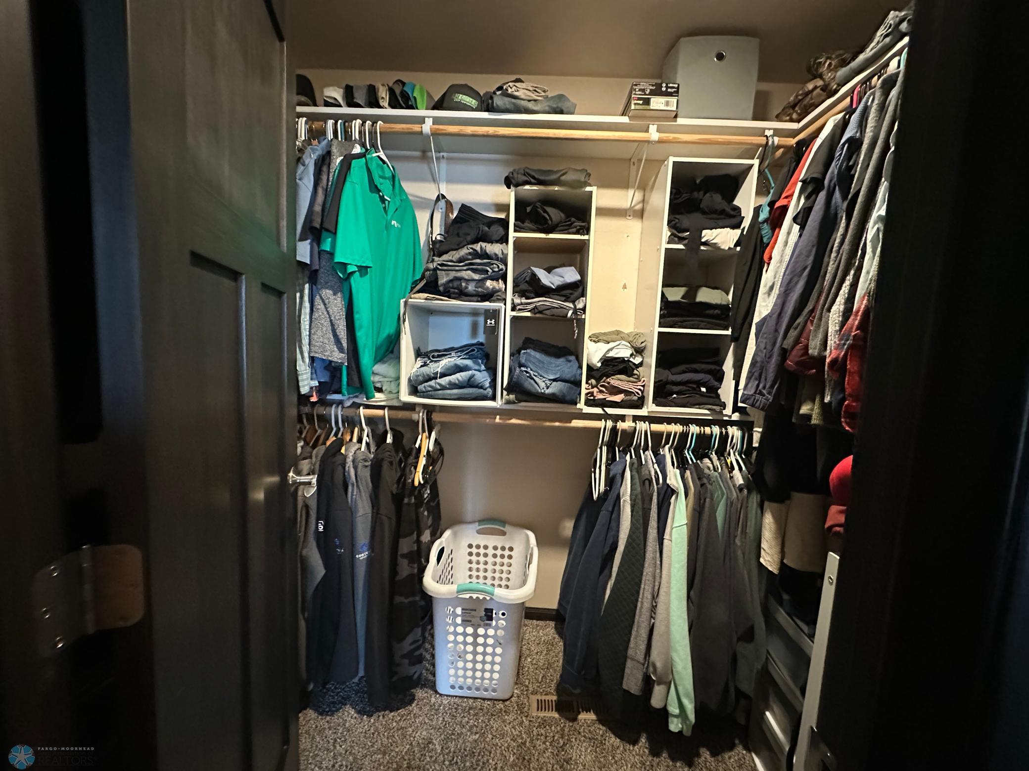 Primary Bedroom walk-in closet