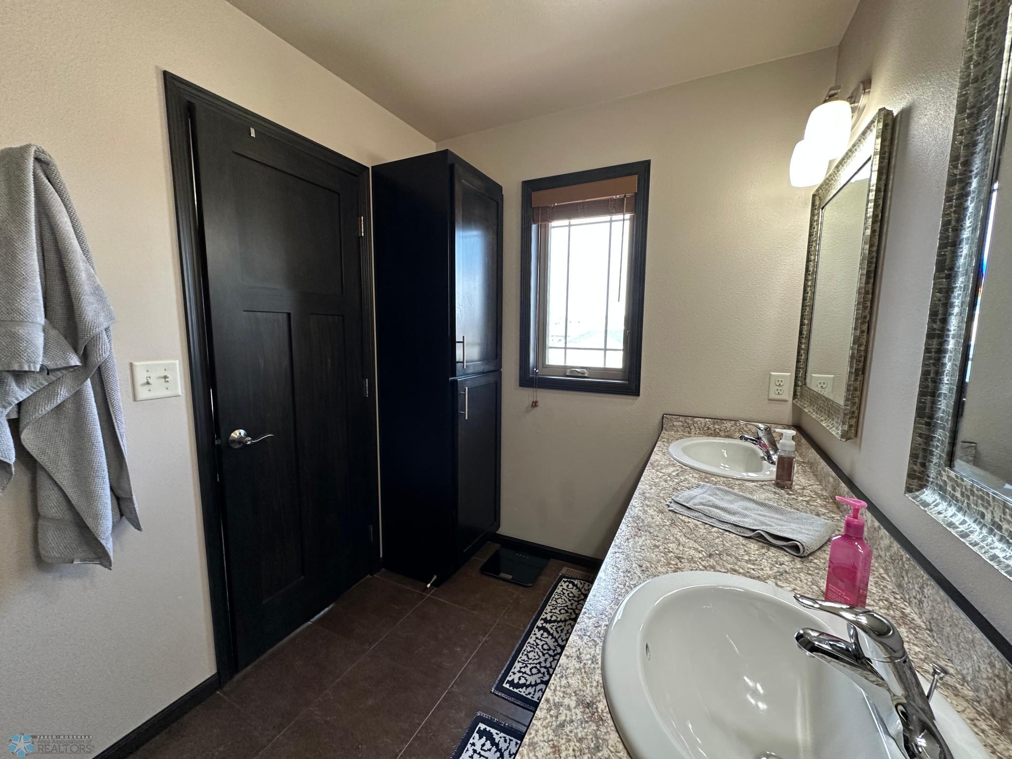 Primary bath linen cabinet