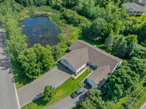 Rare find - check out this setting with wetland and treed privacy!