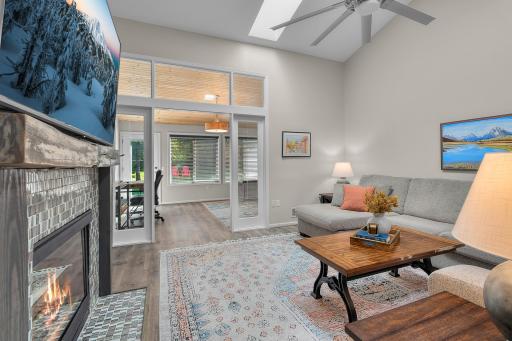 Wow! Walkway flanked with windows as you enter the inviting sunroom.
