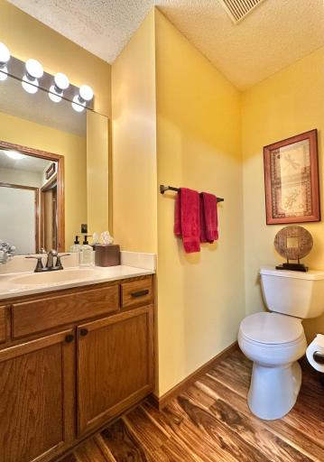 The main level half bath is very convenient located just off the garage and next to the laundry.
