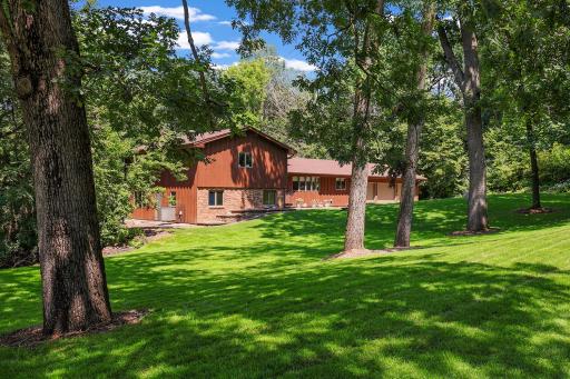 Welcome home! This wooded acreage property is available for the first time since built in 1976.