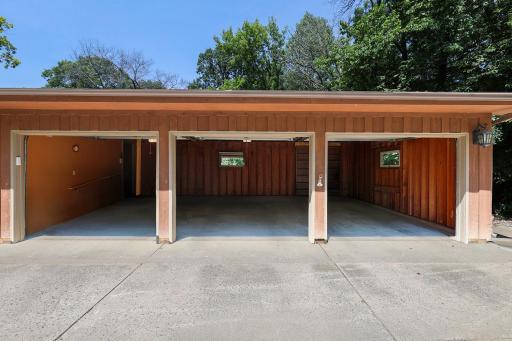 The home's wide concrete driveway compliments the oversized 3-car garage. Garage interior dimensions are 32' wide and 25' deep. Wheelchair ramp access to the home from inside the garage.