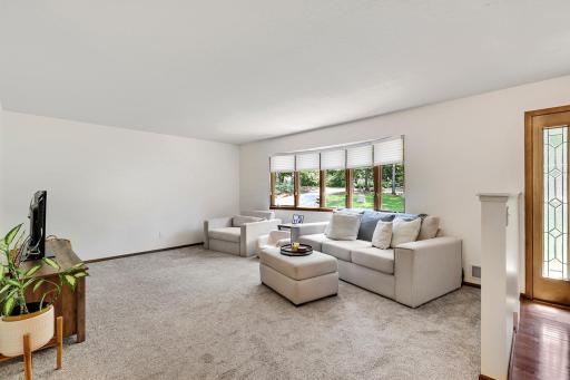 The main floor living room is a spacious 18' x 14' in size and can easily accommodate larger furnishings.