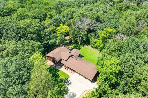 Aerial view of home. Most everything you see in this photo is actually the 2.5-acre property itself. As you can see it is a very private and secluded location.