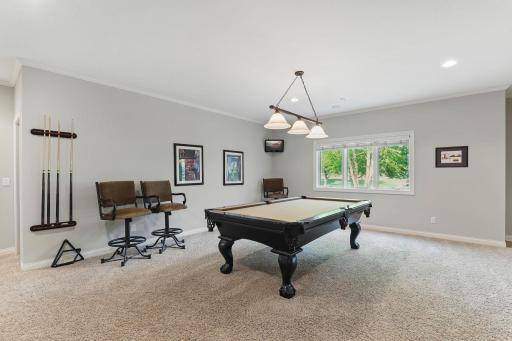 Recreational Room Pool Foosball Table Tennis Gold Simulator The Options are Endless 13478 Clearwater Cir.jpg