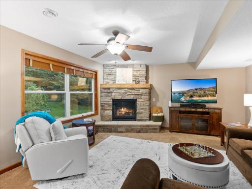 Custom stone fireplace with custom mantel.