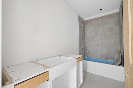 Full bathroom in lower level - photo taken 3/29