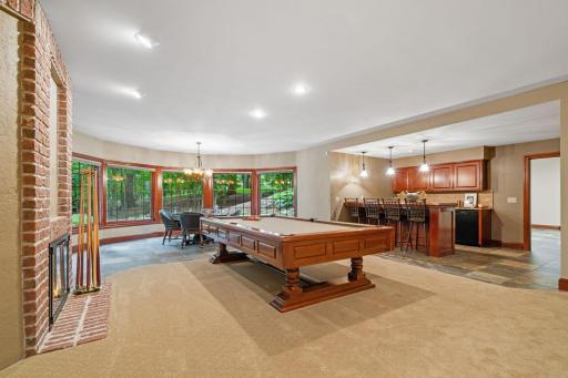 Complete with a large game room and stylish bar.