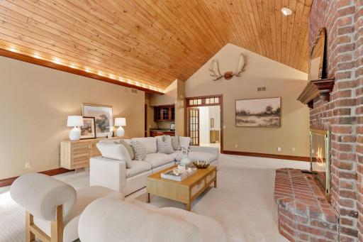A vaulted veiling and wood accents provide an airy, but cozy feel.
