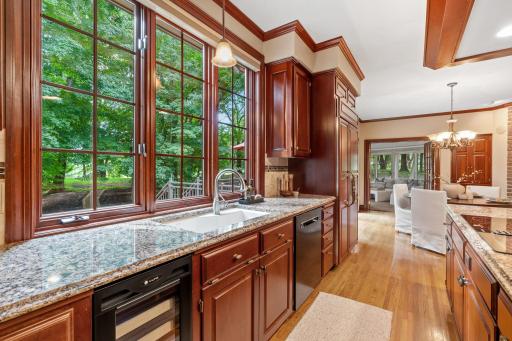 Enjoy views of the beautiful back yard from your kitchen sink.