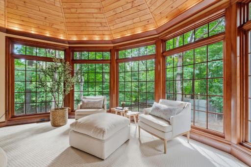 Lighting around the perimeter of the room adds ambiance.