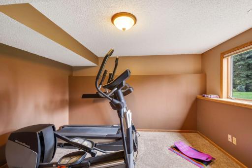 The 4th bedroom also makes a great workout space. There is a finished large storage room behind this bedroom not pictured.