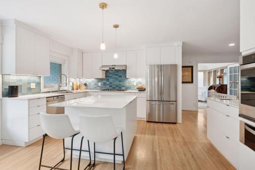 Center island, real hardwood floors, wet bar.