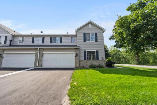 Welcome to this beautifully maintained 3-bedroom, 2-bathroom end-unit townhome, situated on a spacious corner lot that offers additional privacy and abundant natural light.