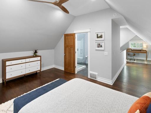 The private master suite features a walk-in closet and stunning bathroom
