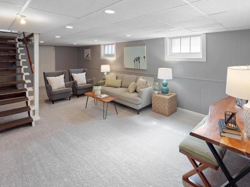The lower level includes a large family room perfect a theatre space. New carpet!