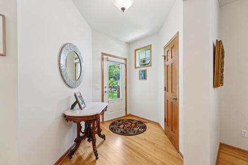 Inside front door with hall closet for coats and shoes.