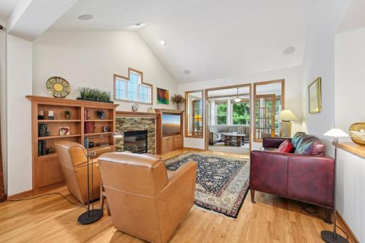 View of the open floor plan looking toward the private back yard and sun room.