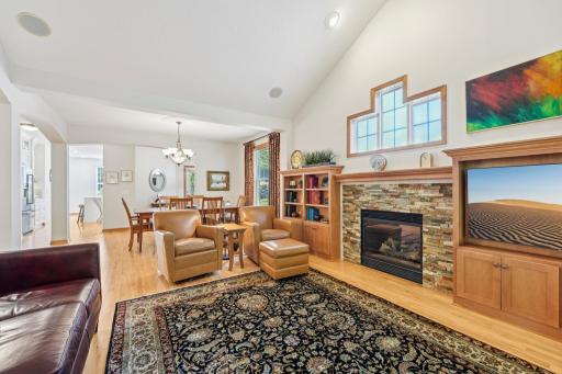 Spacious main floor living area with gas fireplace.