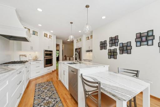 Spacious kitchen with sit in areas for coffee and entertaining guests.