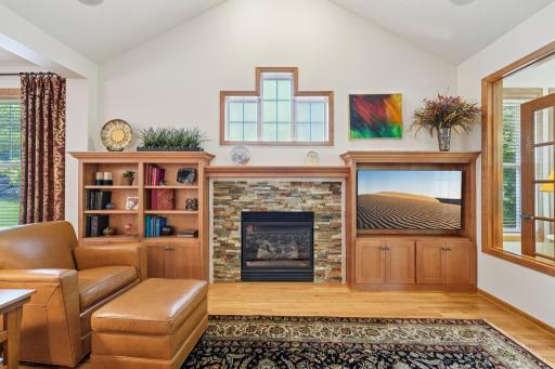 Custom built cabinets and tile work around the fireplace.