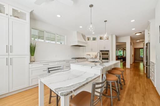 A lot of counter space with many cabinets and drawers for added storage.