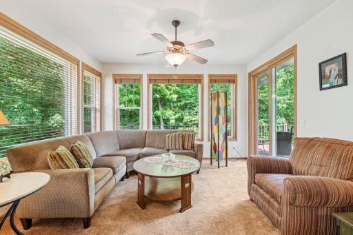Wonderful peaceful sun room with access to your maintenance free deck and peaceful backyard.
