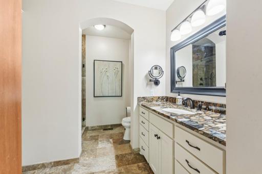 Privat 3/4 primary bath updated with a large linen closet to the left for added storage. Tall counter tops.