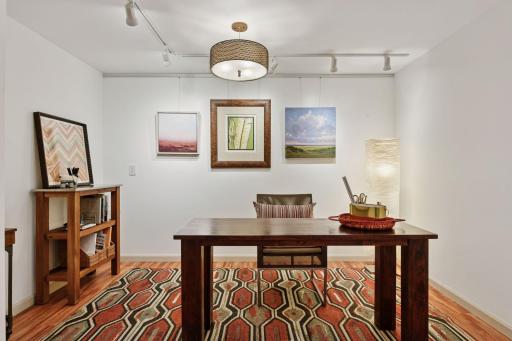 Versatile lower level space can be used as an office or additional lounge space