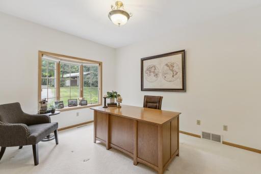Opposite the formal dining is the study with a bay window overlooking the driveway into the property. This room is almost 11x14 providing plenty of space for a home office. There is fiber internet available, ideal for working from home at the lake.