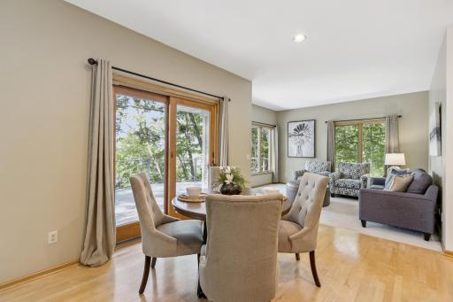 Just off the kitchen and informal dining room is the patio door leading to the deck as well as a lakeside den overlooking the shores of Lake Pulaski. This location is hard to beat being inside city limits with nearly three acres of wooded privacy.