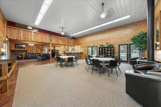 Full kitchen w/new appliances, a spacious living area w/wood-burning stove, four bathrooms with in-floor heat, & plenty of space perfect for getting ready, including a finished upper-level loft. Ideal for weddings, parties, retreats, and more!