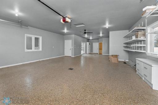 Epoxy chip floors. Floor Drain. Storage shelves. Access to courtyard & house