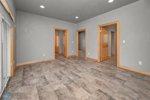 Flex Room. Patio doors to Courtyard. Family room, Craft room, Office, Play room, Den? The options are endless!