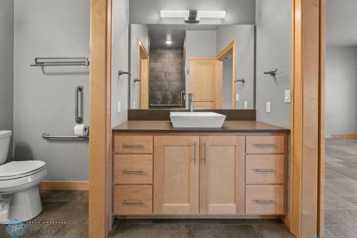 Master Bath offers double sinks, plenty of storage, high ceilings.