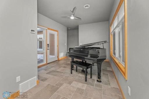 Bright foyer with tons of light, storage closet & maintenance-free flooring for those ND winters!
