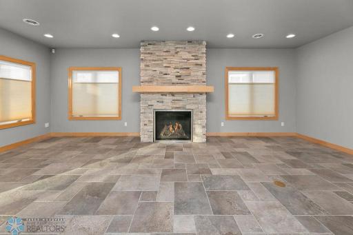Floor to ceiling Fireplace, Recessed lighting, Cordless blinds.