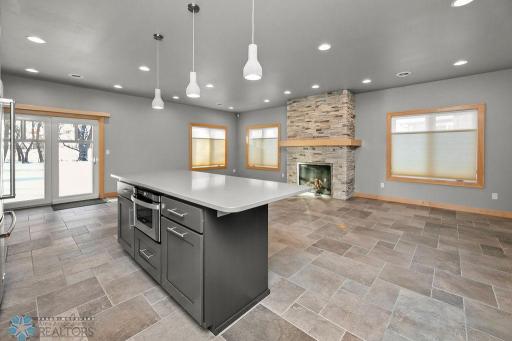 Spacious kitchen island offers seating and storage