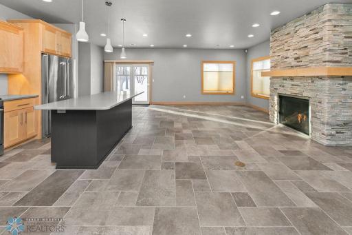 Living Room & Dining area open out to your private, panoramic view of the Sheyenne River