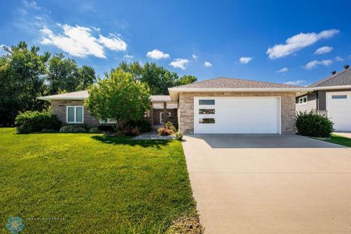 Custom-built slab-on-grade riverside home on 1+ acre!