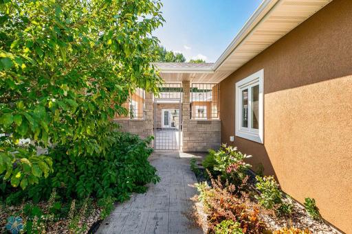 Courtyard entrance allows for privacy & keeps pets & kids contained